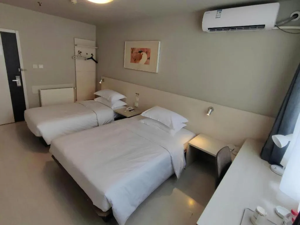 Bed in Jinjiang Inn Qingdao International Exhibition Center Haier Road