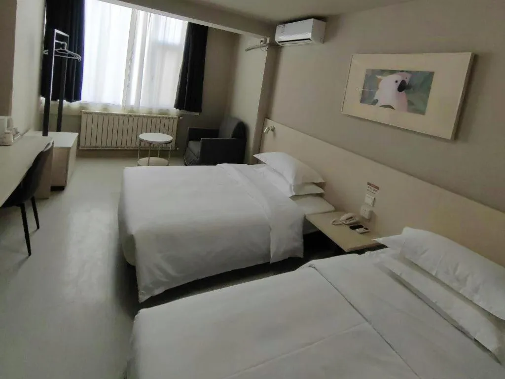 Bed in Jinjiang Inn Qingdao International Exhibition Center Haier Road