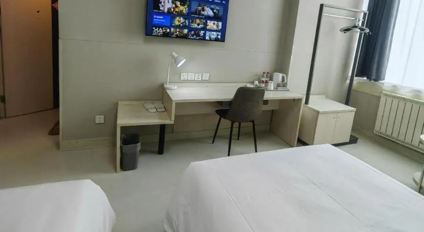 Bed in Jinjiang Inn Qingdao International Exhibition Center Haier Road