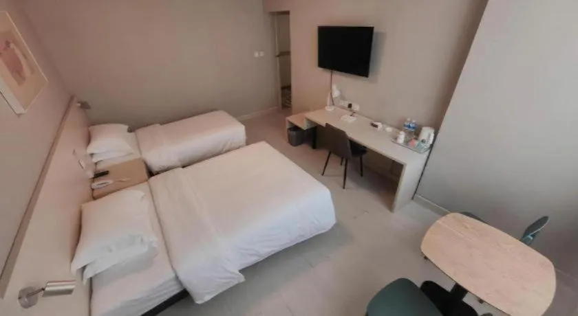 Bed in Jinjiang Inn Qingdao International Exhibition Center Haier Road