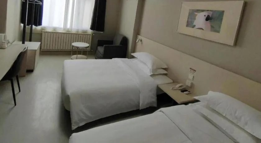 Bed in Jinjiang Inn Qingdao International Exhibition Center Haier Road