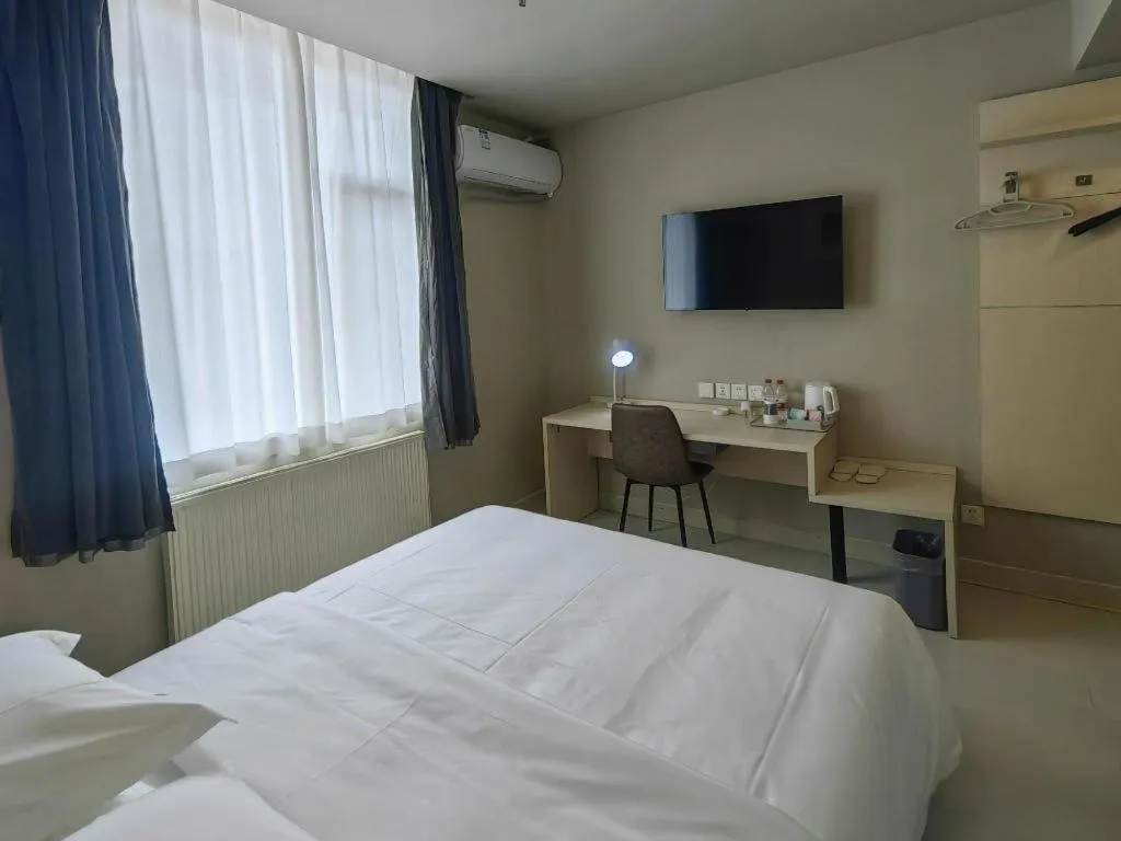 Bed in Jinjiang Inn Qingdao International Exhibition Center Haier Road