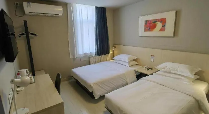 Bed in Jinjiang Inn Qingdao International Exhibition Center Haier Road