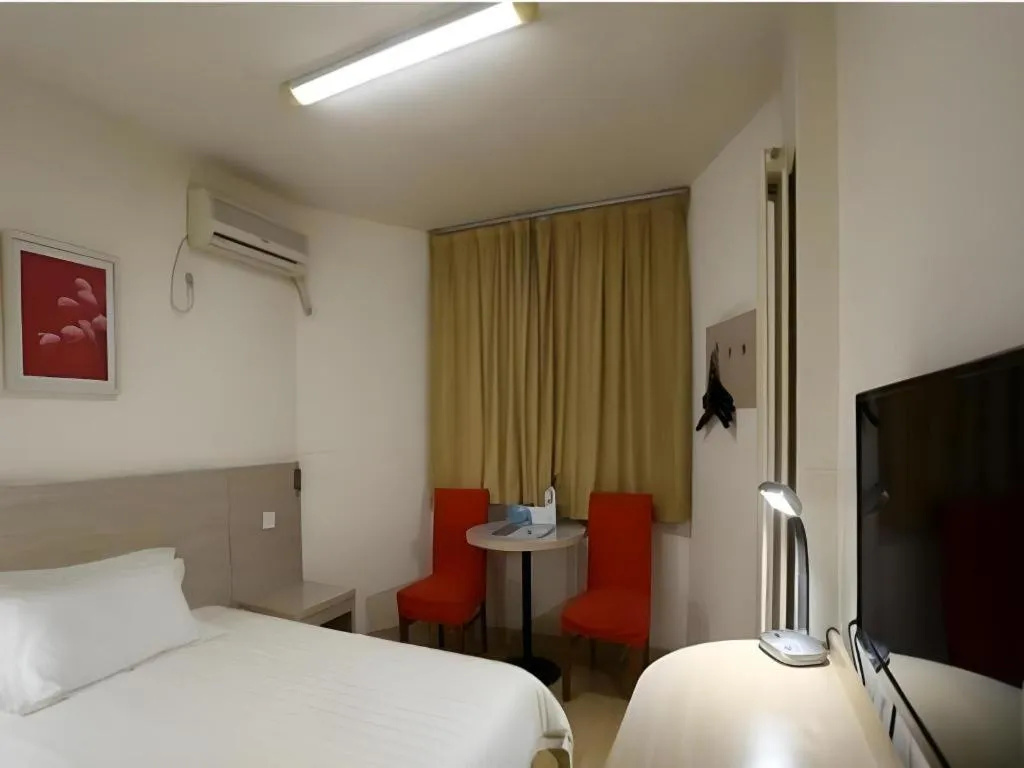 Bed in Jinjiang Inn Qingdao International Exhibition Center Haier Road