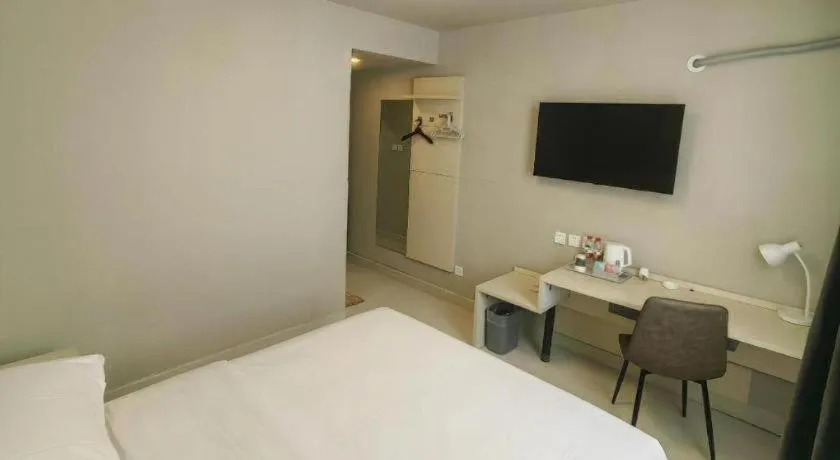 Bed in Jinjiang Inn Qingdao International Exhibition Center Haier Road