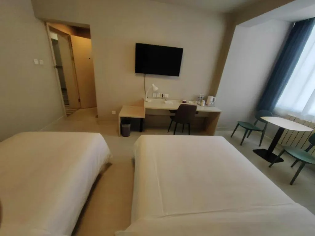 Bed in Jinjiang Inn Qingdao International Exhibition Center Haier Road