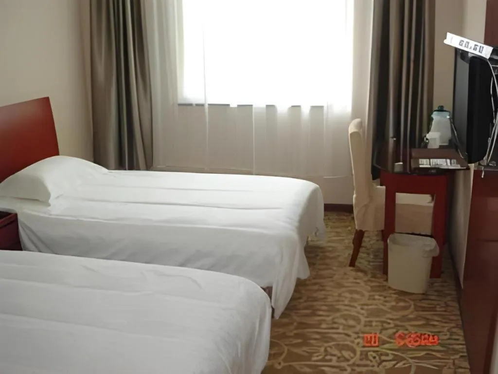 Bed in GreenTree Inn Jining Jianshe Road Hotel