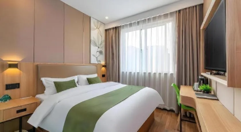 Bed in GreenTree Inn Jining Jianshe Road Hotel
