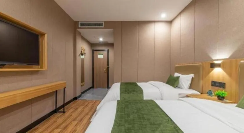 Bed in GreenTree Inn Jining Jianshe Road Hotel