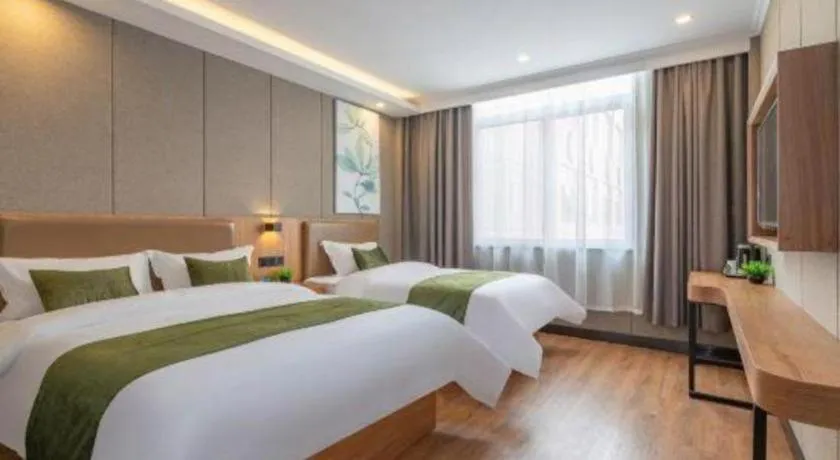 Bed in GreenTree Inn Jining Jianshe Road Hotel