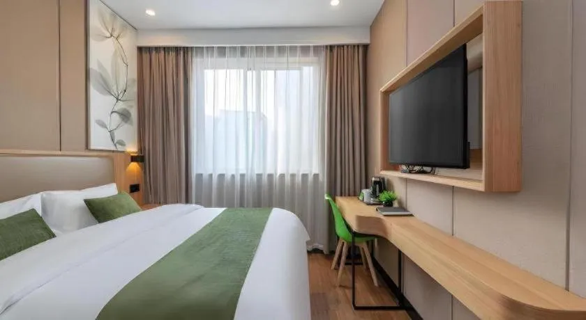 Bed in GreenTree Inn Jining Jianshe Road Hotel