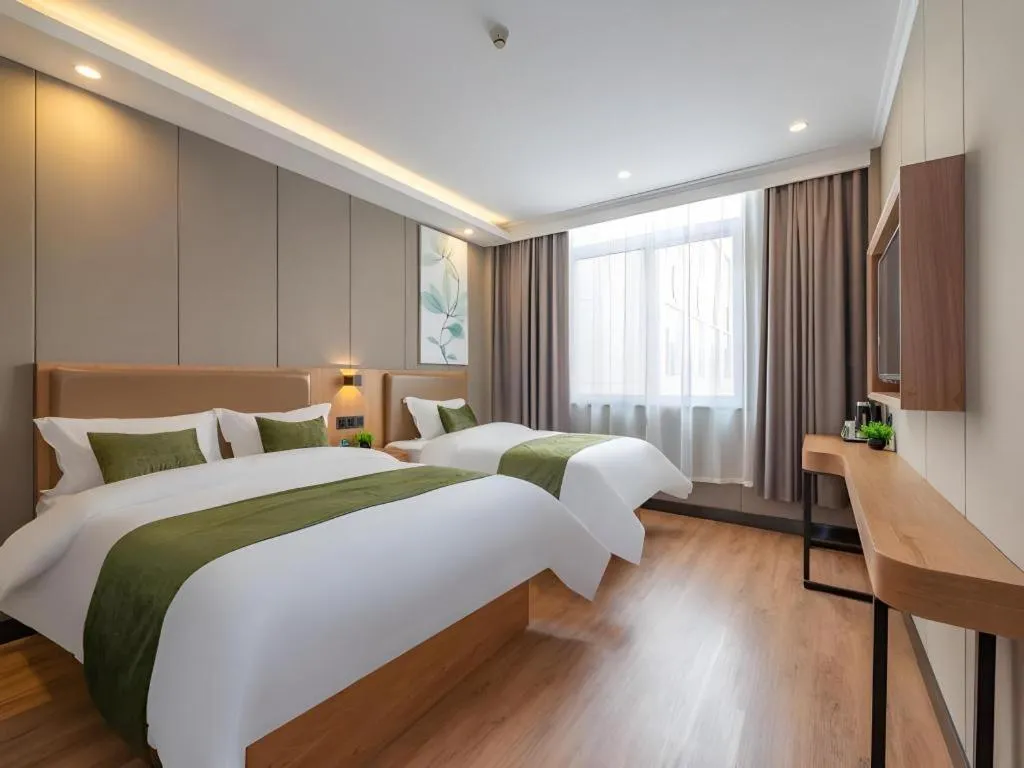 Bed in GreenTree Inn Jining Jianshe Road Hotel