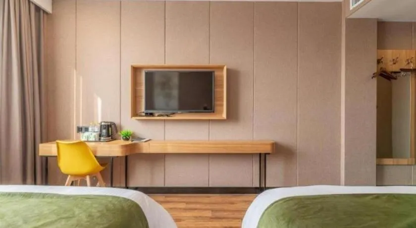 Bed in GreenTree Inn Jining Jianshe Road Hotel