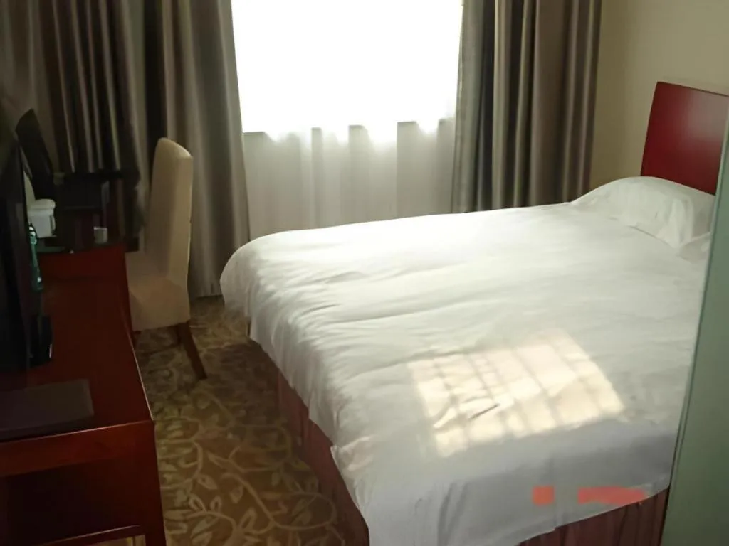 Bed in GreenTree Inn Jining Jianshe Road Hotel