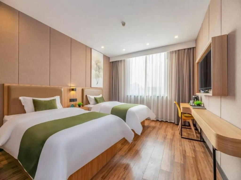 Bed in GreenTree Inn Jining Jianshe Road Hotel