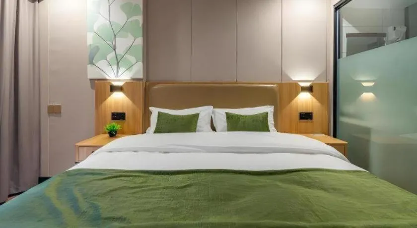 Bed in GreenTree Inn Jining Jianshe Road Hotel