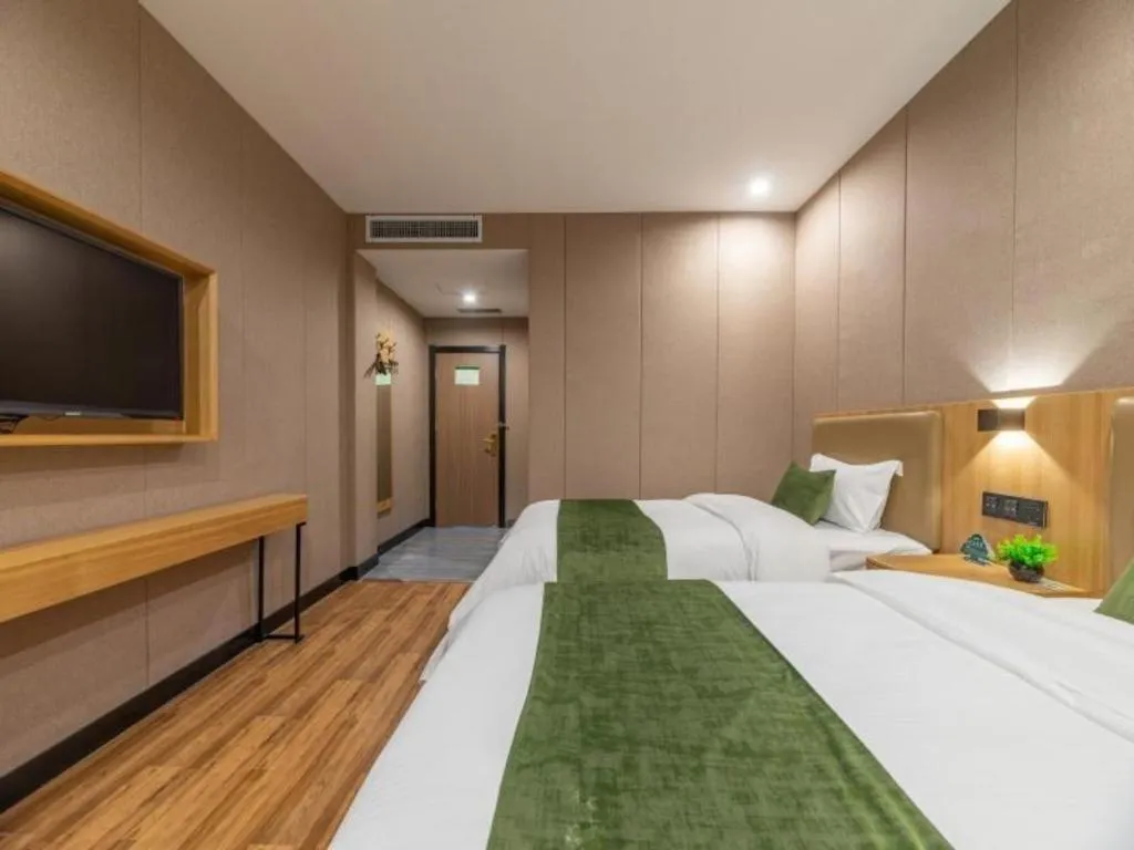 Bed in GreenTree Inn Jining Jianshe Road Hotel