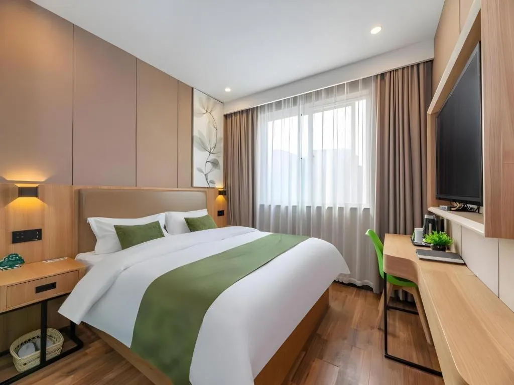 Bed in GreenTree Inn Jining Jianshe Road Hotel
