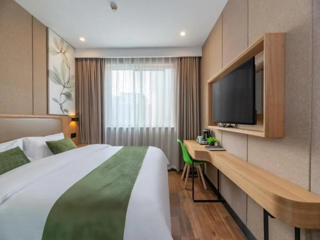 Bed in GreenTree Inn Jining Jianshe Road Hotel
