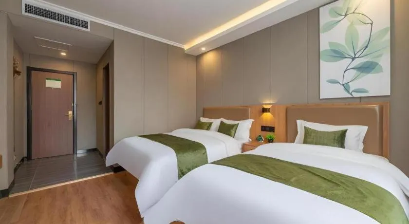 Bed in GreenTree Inn Jining Jianshe Road Hotel