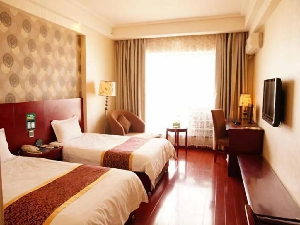 Bed in GreenTree Inn Jiuquan Century Plaza Hotel