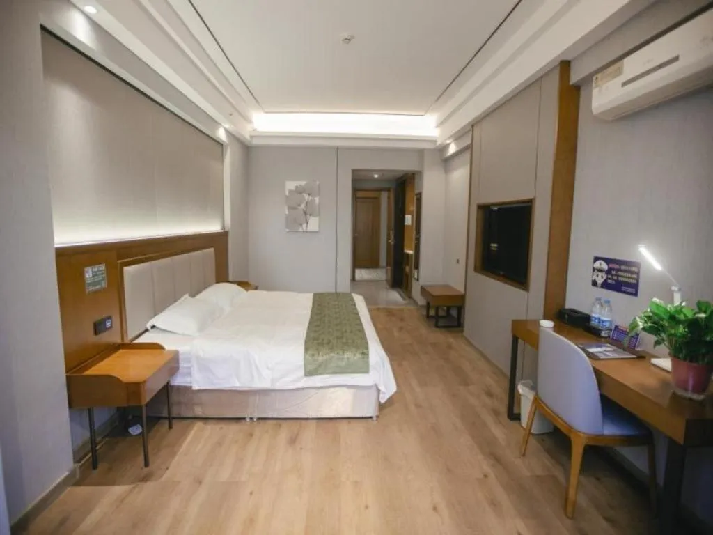 Bed in GreenTree Inn Jiuquan Century Plaza Hotel