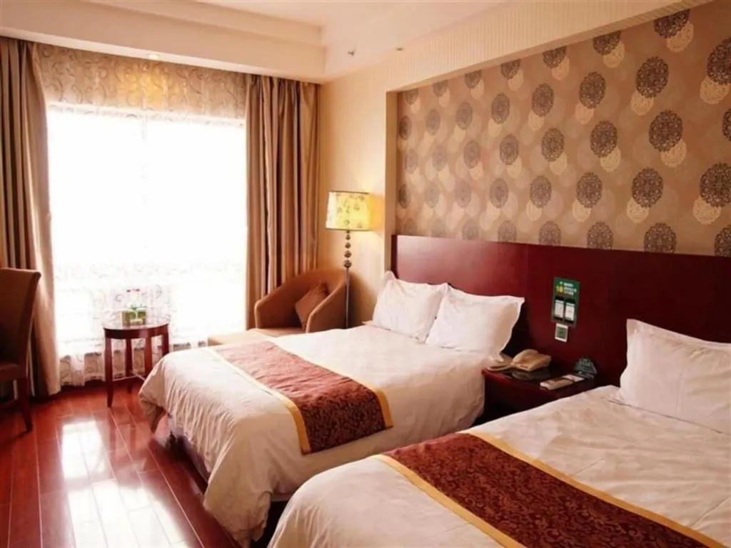 Bed in GreenTree Inn Jiuquan Century Plaza Hotel