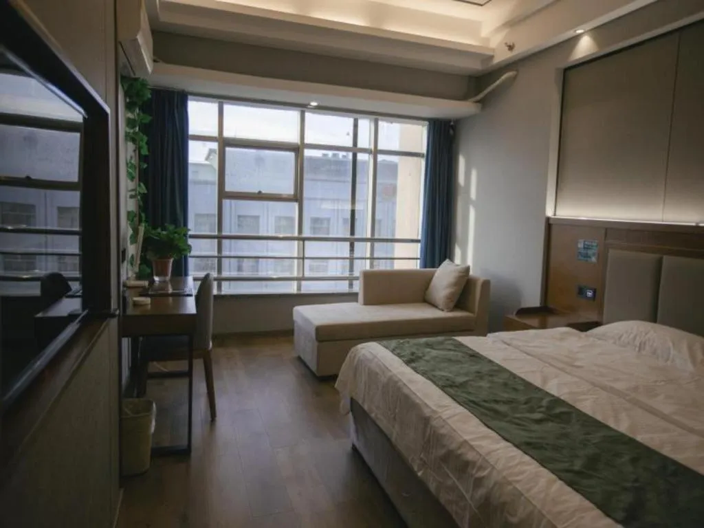 Bed in GreenTree Inn Jiuquan Century Plaza Hotel