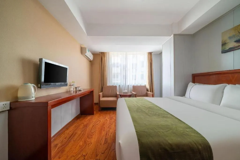 Bed in GreenTree Inn Yantai Xingfu Road Marina Plaza Express Hotel