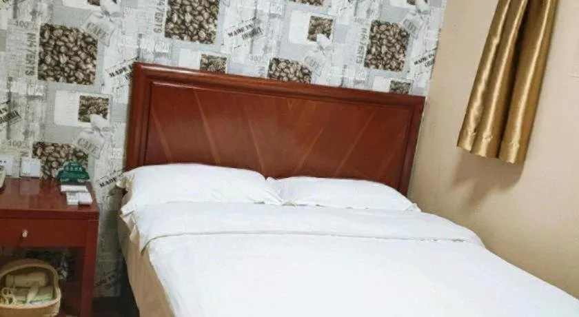 Bed in GreenTree Inn Yantai Xingfu Road Marina Plaza Express Hotel