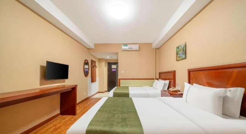 Bed in GreenTree Inn Yantai Xingfu Road Marina Plaza Express Hotel