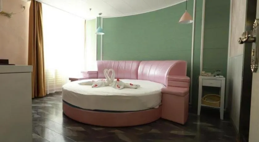 Bed in GreenTree Inn Yantai Xingfu Road Marina Plaza Express Hotel