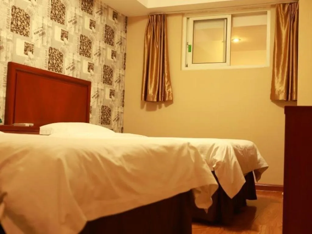 Bed in GreenTree Inn Yantai Xingfu Road Marina Plaza Express Hotel