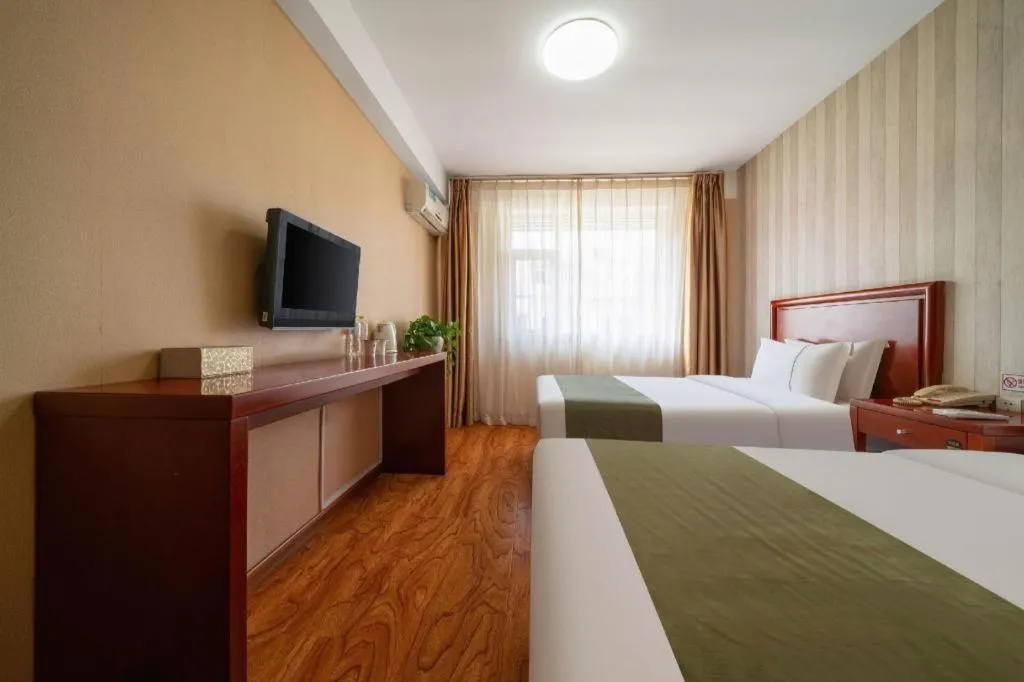 Bed in GreenTree Inn Yantai Xingfu Road Marina Plaza Express Hotel