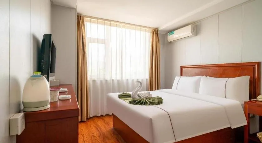 Bed in GreenTree Inn Yantai Xingfu Road Marina Plaza Express Hotel