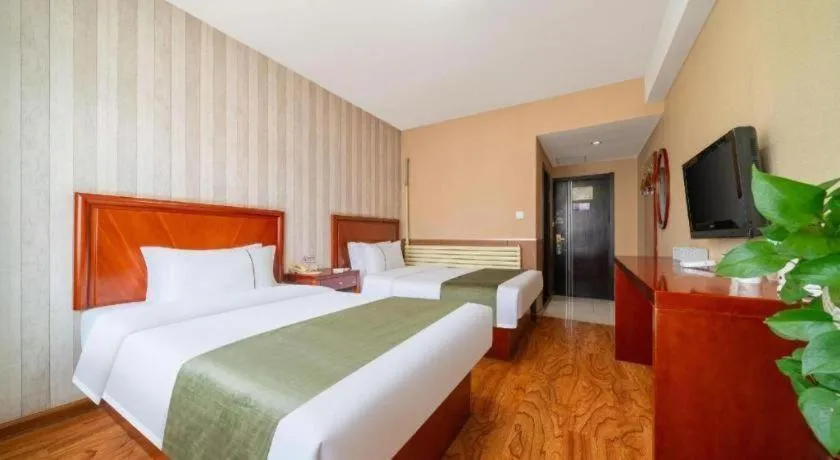 Bed in GreenTree Inn Yantai Xingfu Road Marina Plaza Express Hotel
