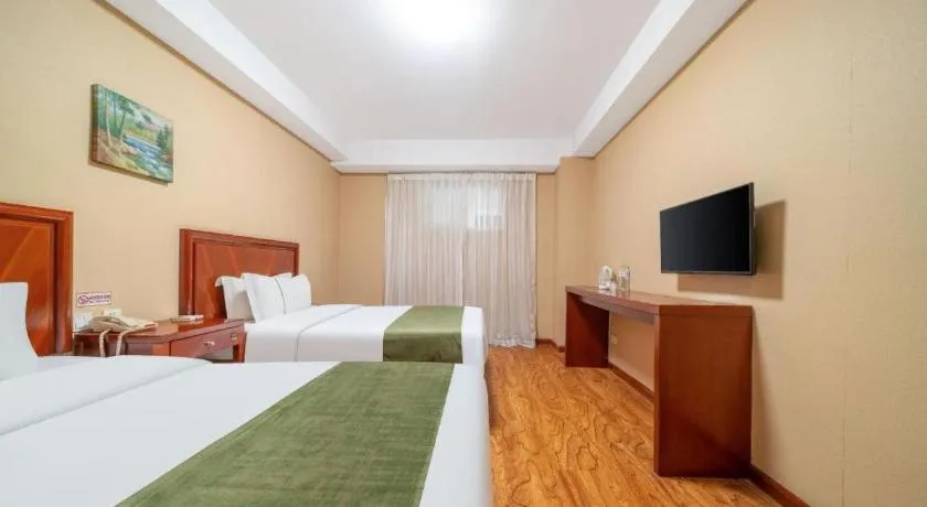 Bed in GreenTree Inn Yantai Xingfu Road Marina Plaza Express Hotel