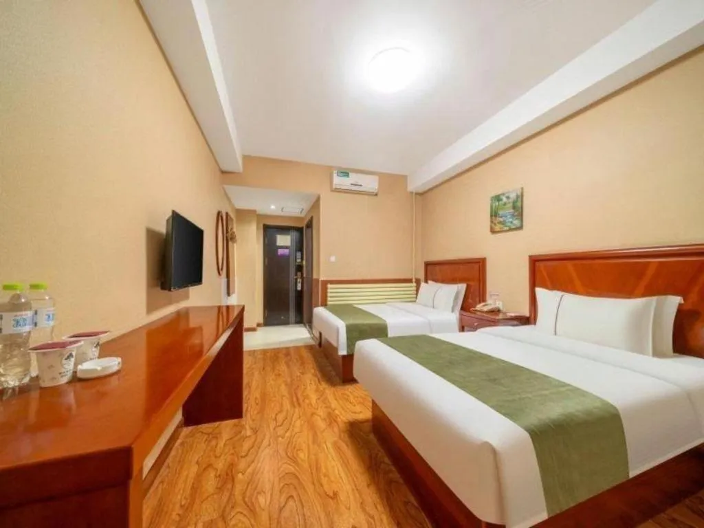 Bed in GreenTree Inn Yantai Xingfu Road Marina Plaza Express Hotel