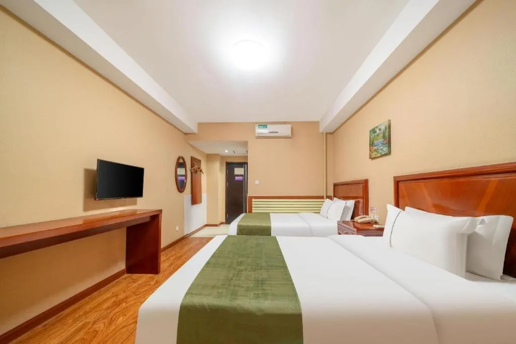 Bed in GreenTree Inn Yantai Xingfu Road Marina Plaza Express Hotel