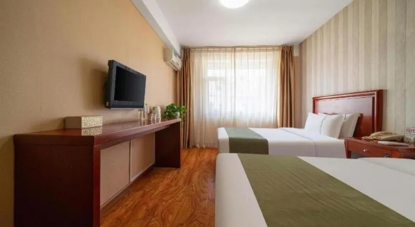 Bed in GreenTree Inn Yantai Xingfu Road Marina Plaza Express Hotel