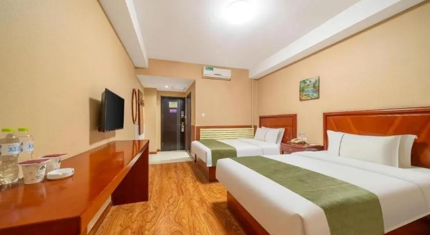Bed in GreenTree Inn Yantai Xingfu Road Marina Plaza Express Hotel