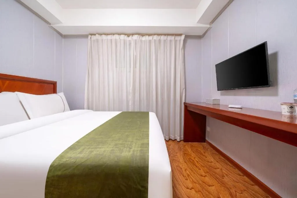 Bed in GreenTree Inn Yantai Xingfu Road Marina Plaza Express Hotel