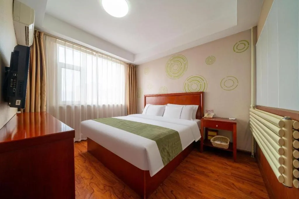 Bed in GreenTree Inn Yantai Xingfu Road Marina Plaza Express Hotel