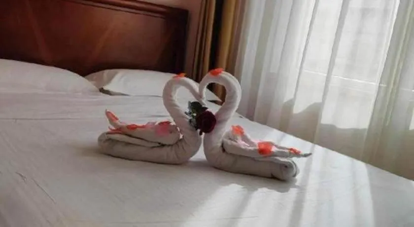 Bed in GreenTree Inn Yantai Xingfu Road Marina Plaza Express Hotel