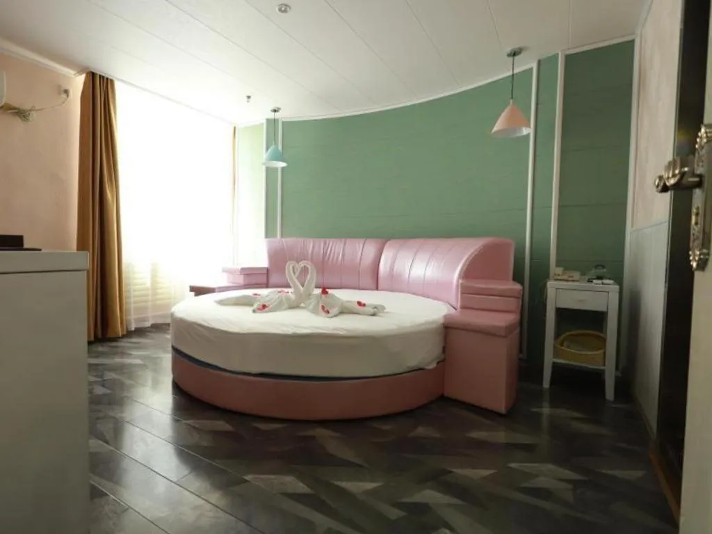 Bed in GreenTree Inn Yantai Xingfu Road Marina Plaza Express Hotel