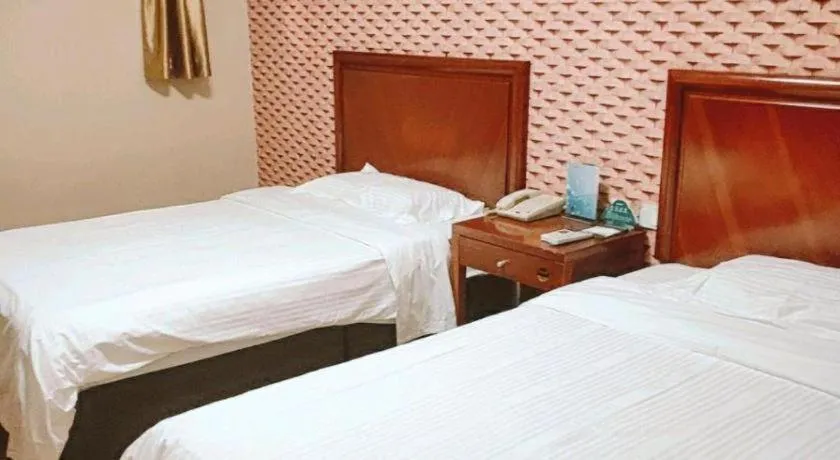 Bed in GreenTree Inn Yantai Xingfu Road Marina Plaza Express Hotel