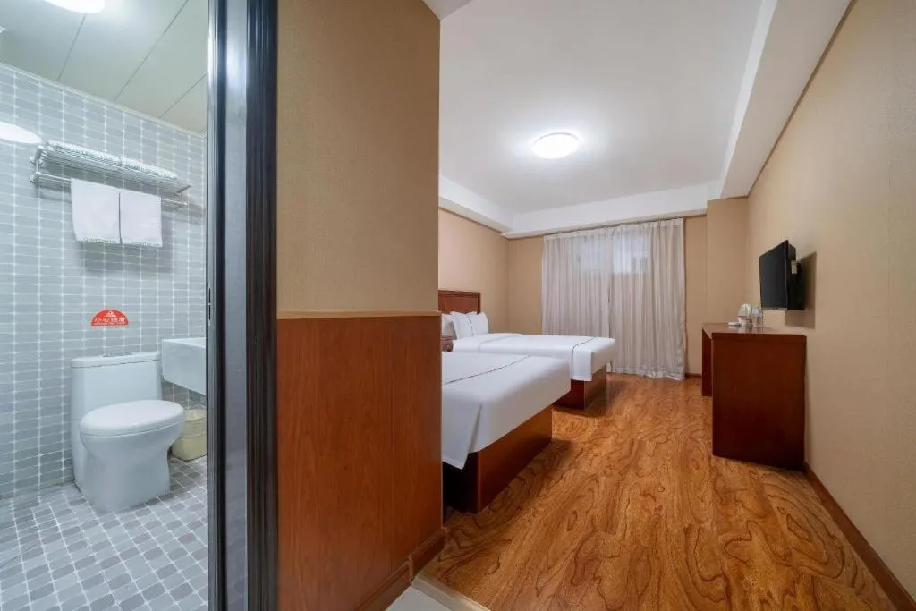 Bed in GreenTree Inn Yantai Xingfu Road Marina Plaza Express Hotel
