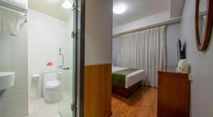 Bed in GreenTree Inn Yantai Xingfu Road Marina Plaza Express Hotel