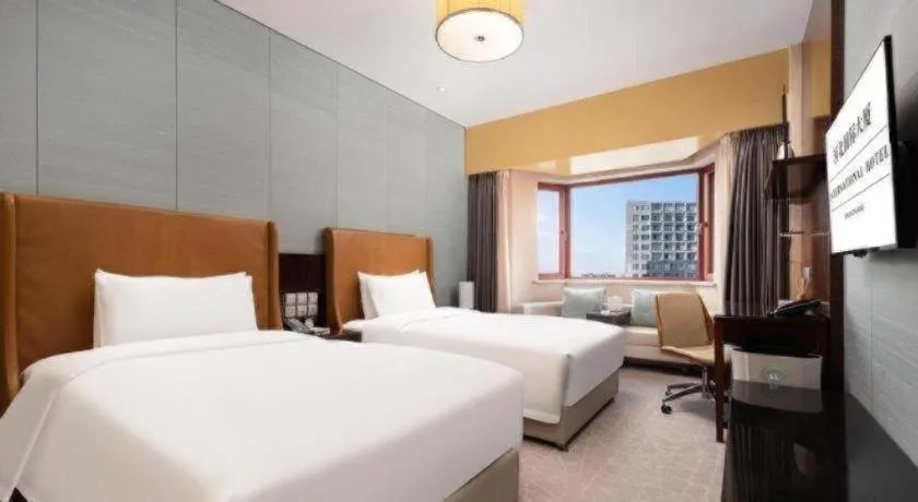 Bed in Shijiazhuang International Building Hotel