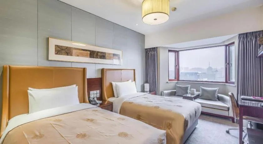 Bed in Shijiazhuang International Building Hotel